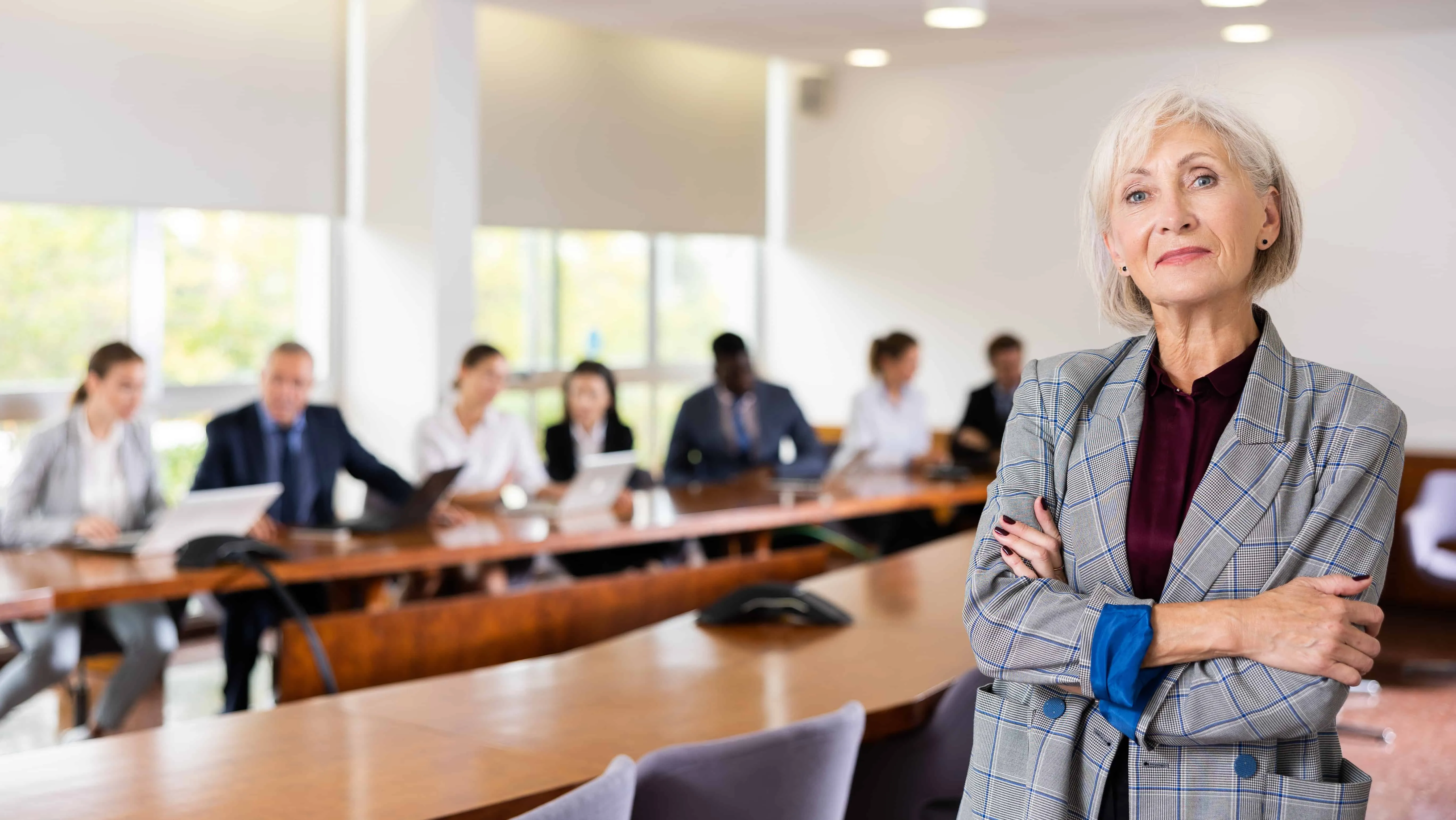 Smiling classy elegant senior mature white businesswoman